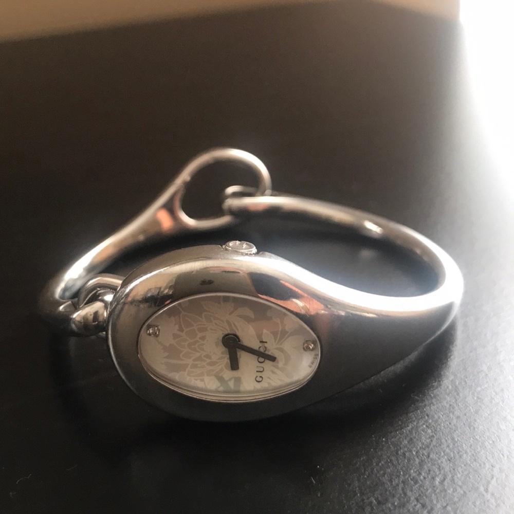 Gucci women’s silver watch diamonds & floral face